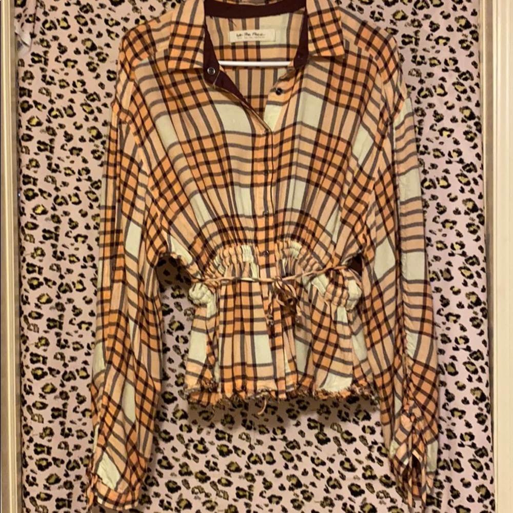 Plaid blouse with clasps and middle tie.